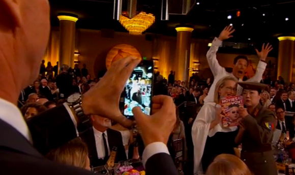 Keaton taking a photo of Meryl w/ Margaret Cho dressed as Kim Jong Cho